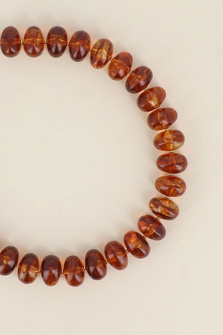 Collier en perles de résine ovales